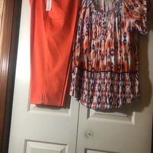Women’s cropped pants and matching shirt. Never worn. Color is matching top.